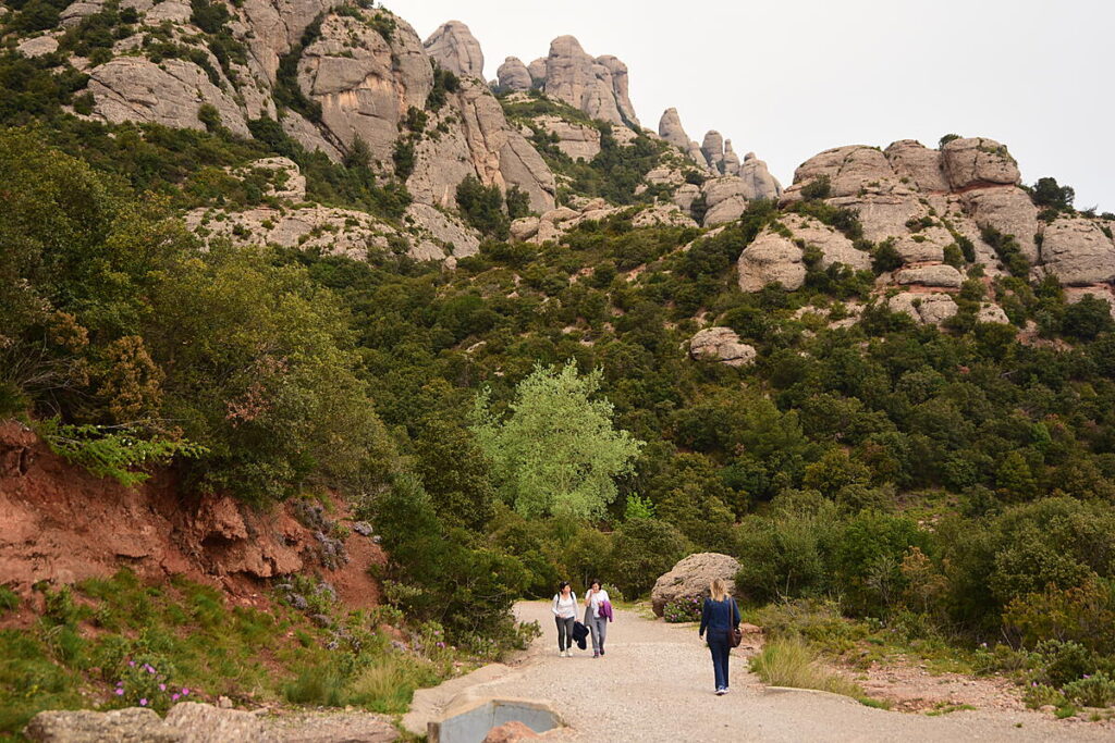 Downhill hiking trail with rock formations on Montserrat Mountain near Barcelona
