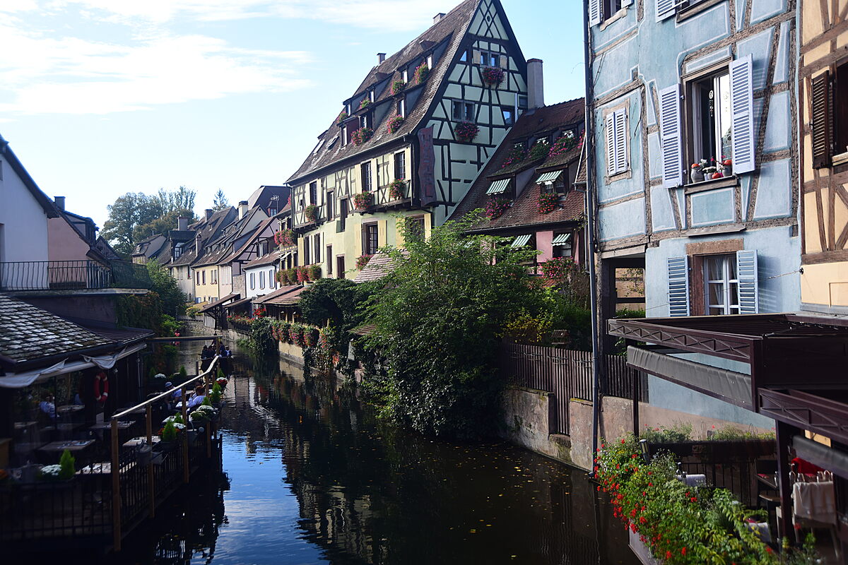 Colorful half-timbered houses lining the canal in Petite Venise, Colmar.